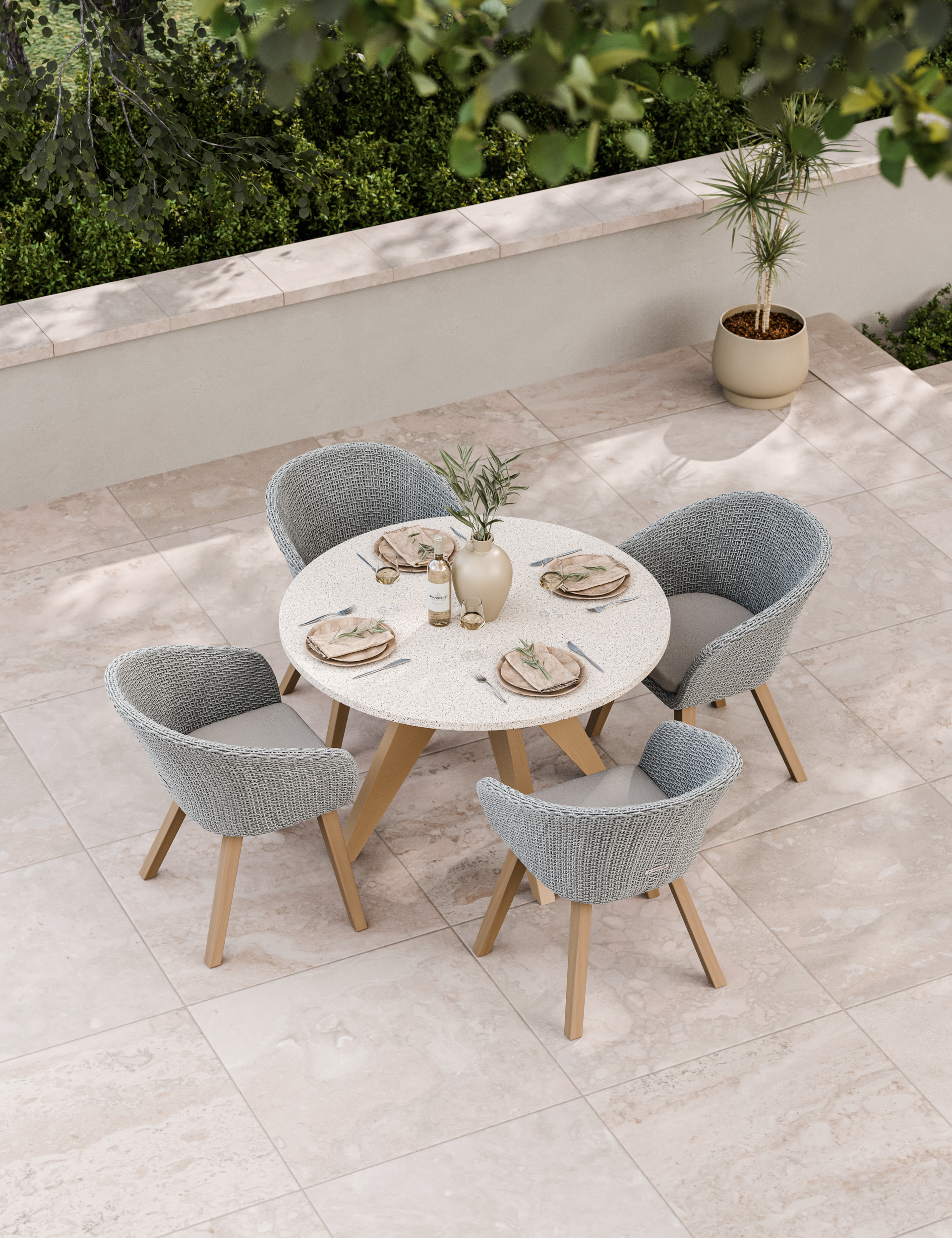 Stylish four-seater round patio dining set in neutral tones