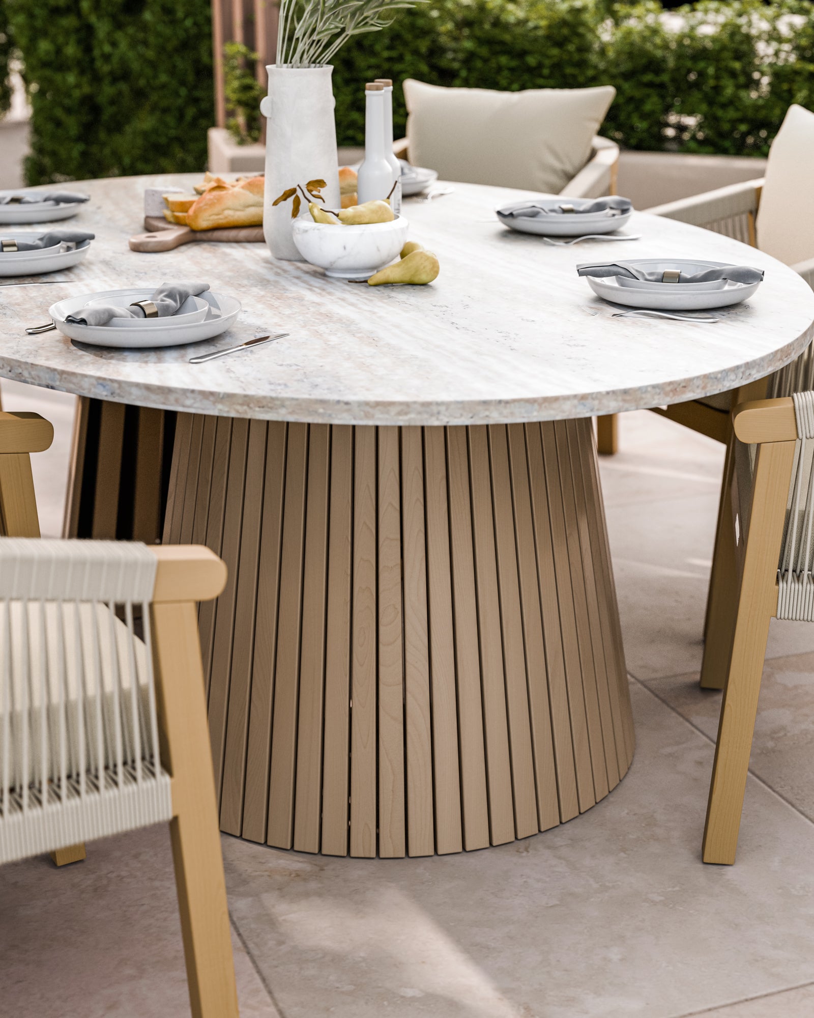 Close‑up of a cushioned rope dining chair by round table