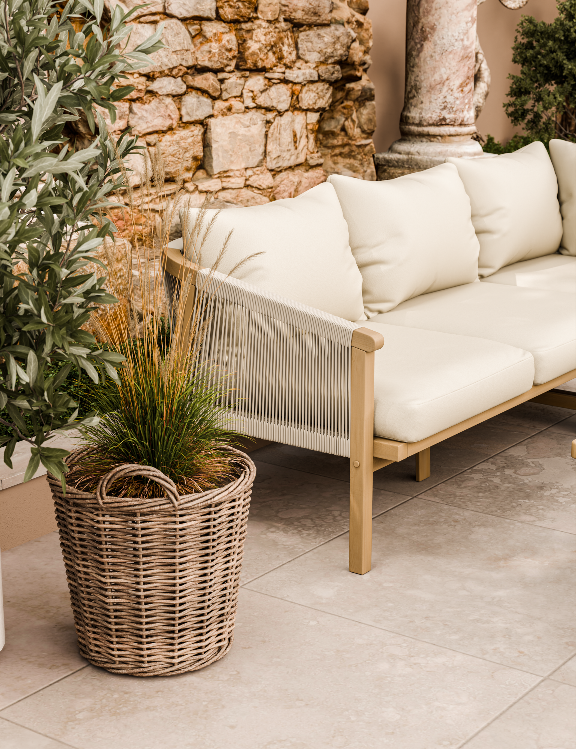 Close-up of cream sofa with rope detail and wicker planter