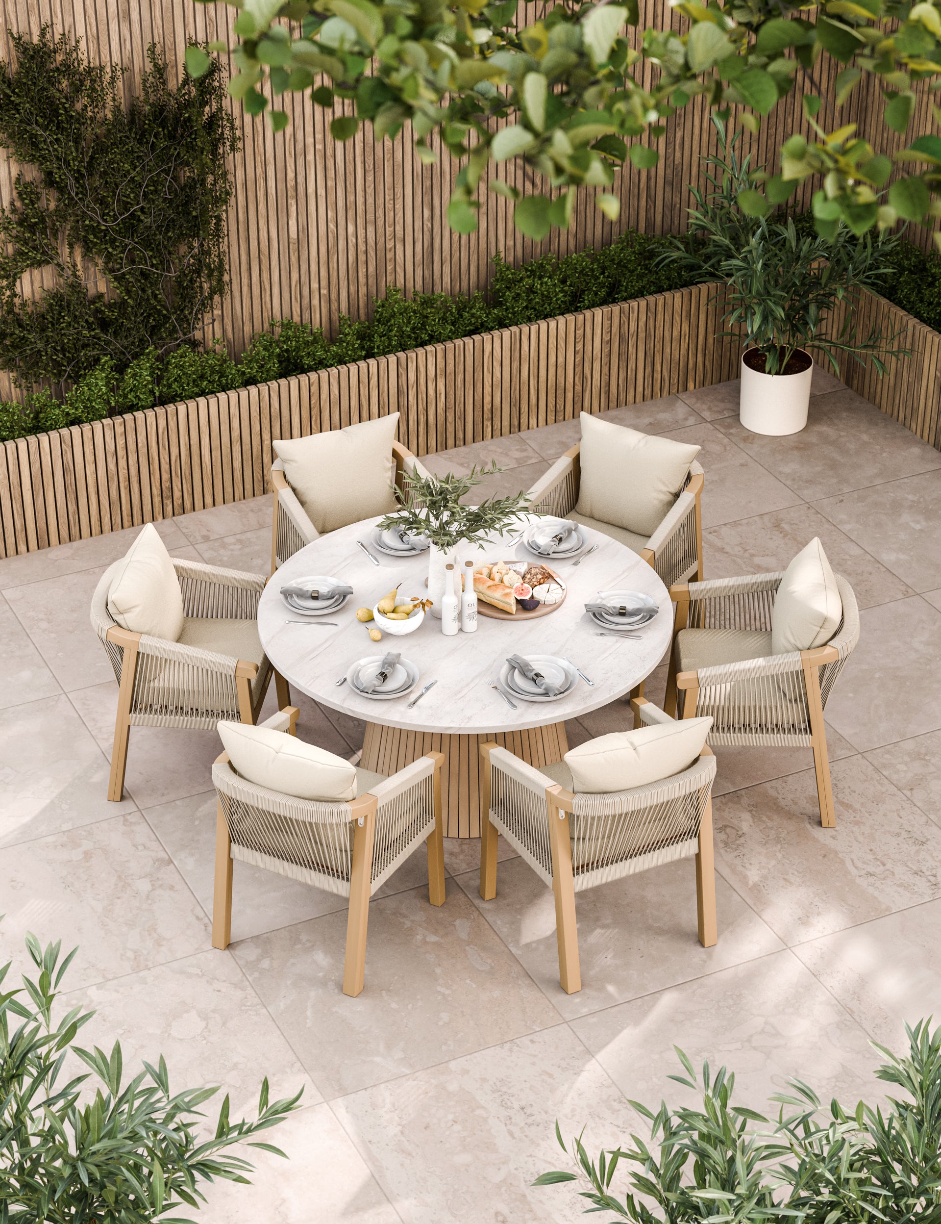Beige outdoor dining set with round table and six chairs