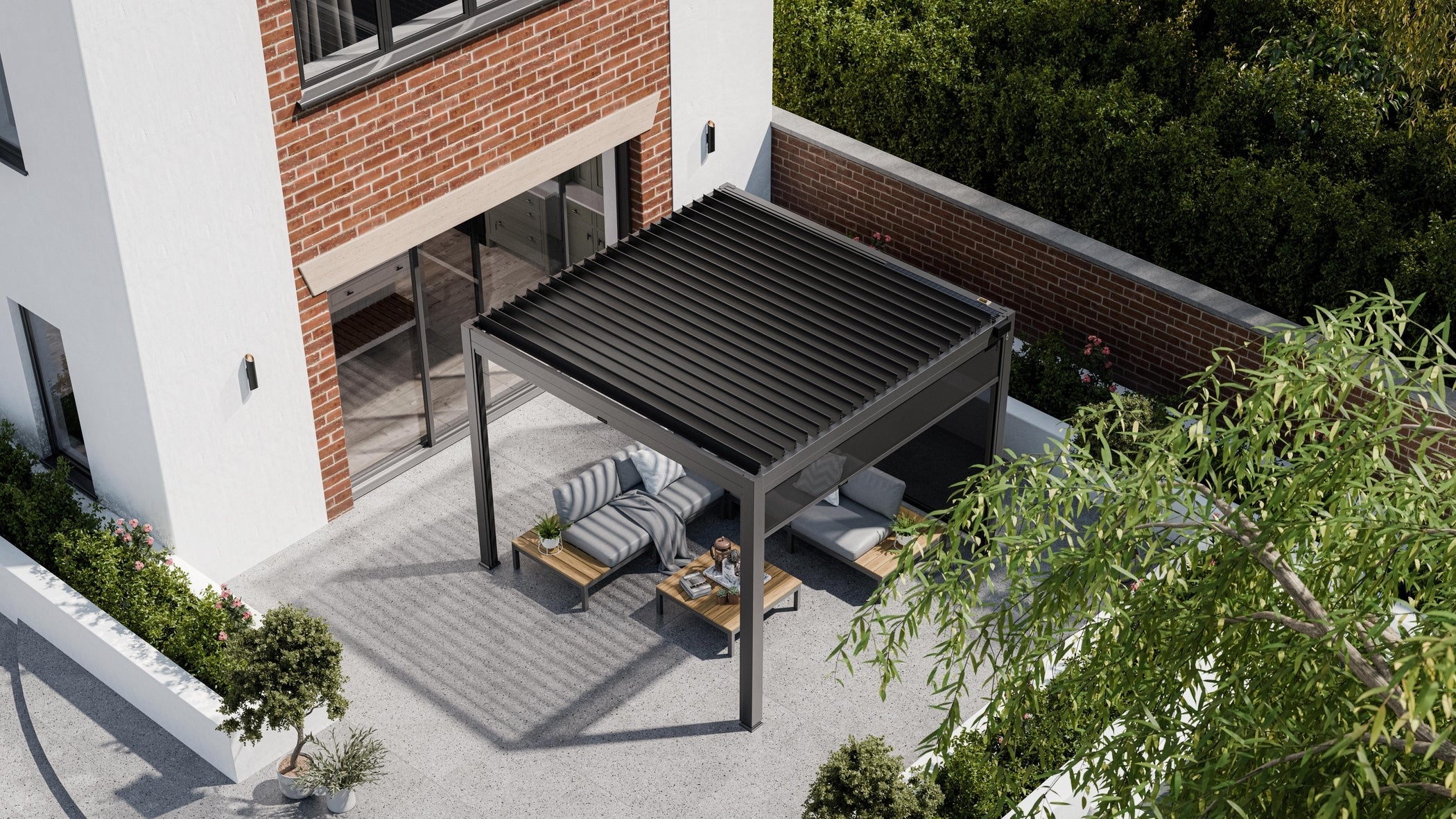 Overhead view of black pergola with closed louvres and grey sofas
