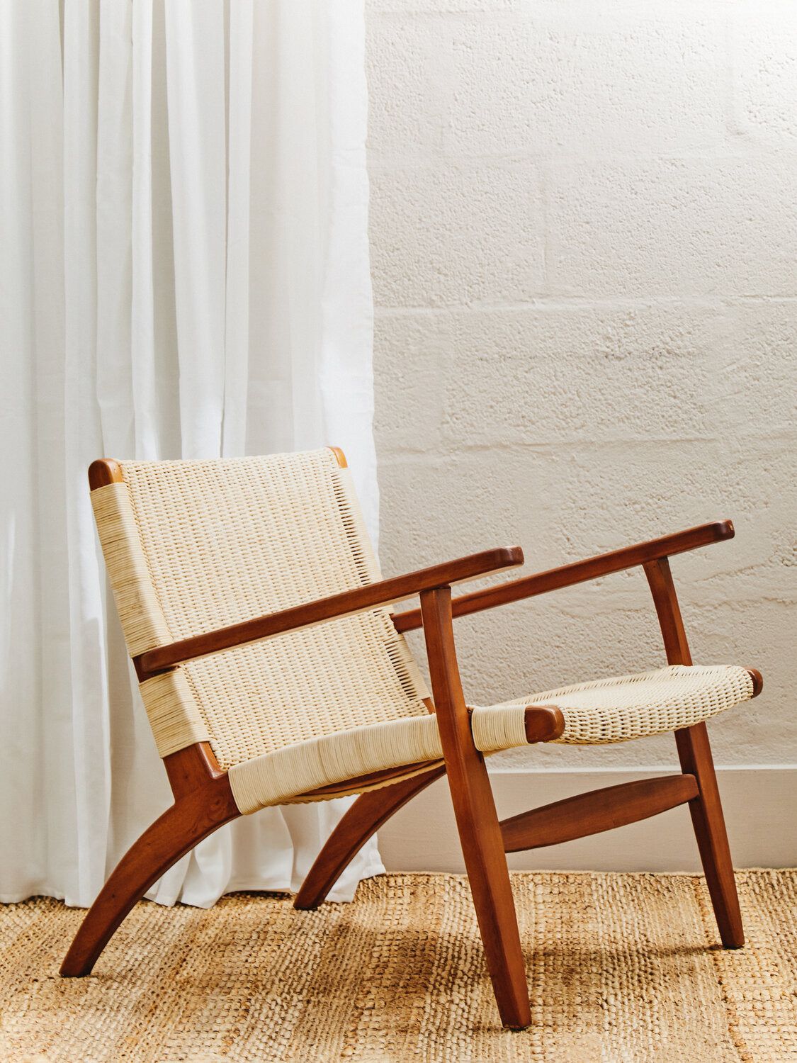 Image of Java Woven Chair In Natural Rattan - Lifestyle