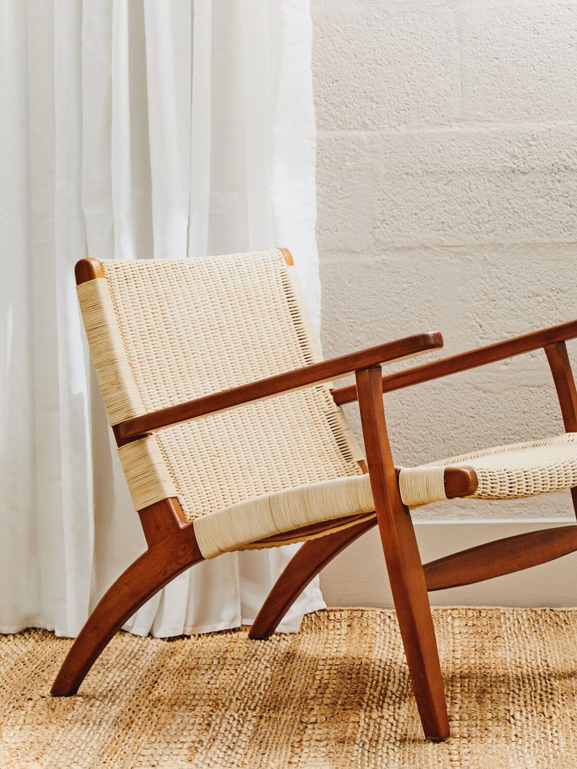 Image of Java Woven Chair In Natural Rattan - Lifestyle
