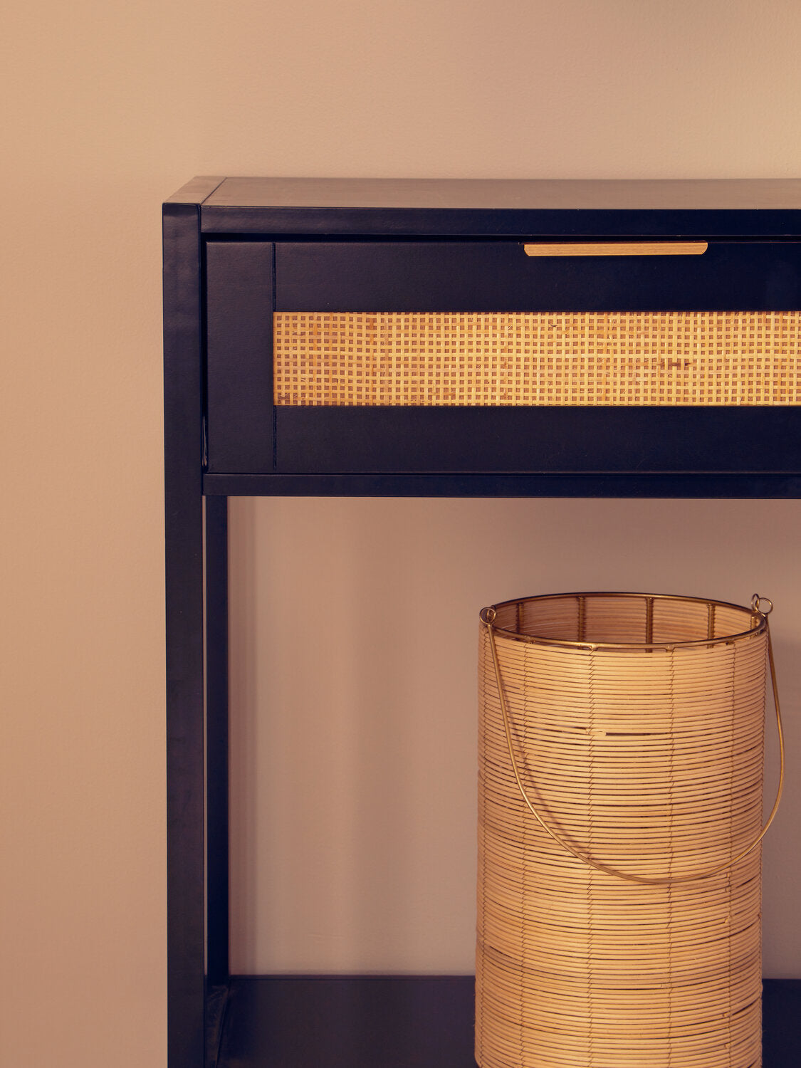 Image of Sherman Black Wood and Rattan Two Drawer Console Table - Lifestyle