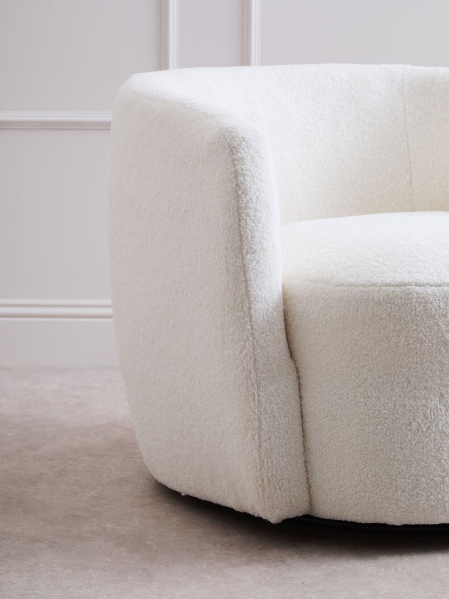 Image of Montreal Ivory Boucle Effect Curved Lounge Chair With Swivel Base
