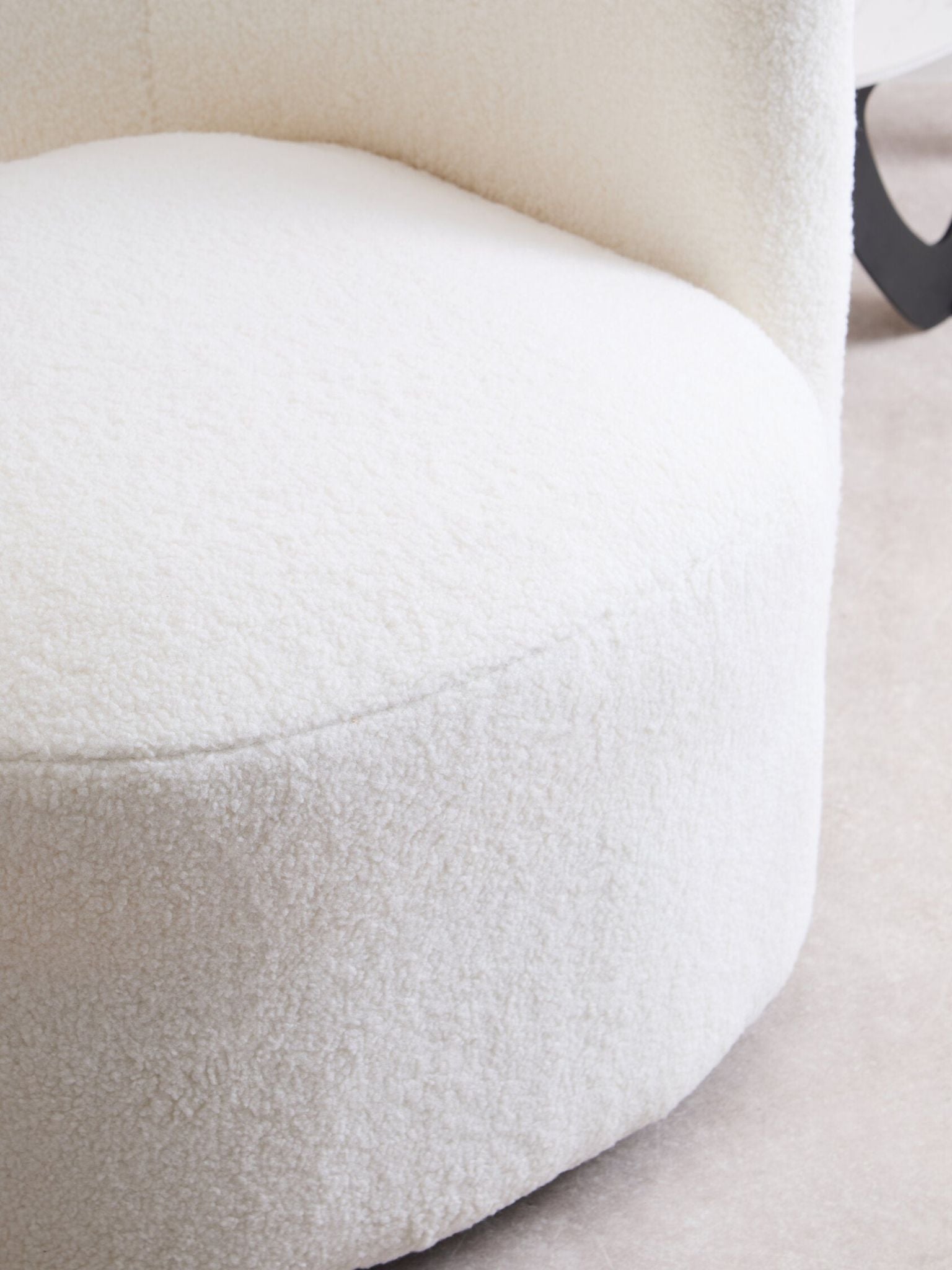 Image of Montreal Ivory Boucle Effect Curved Lounge Chair With Swivel Base