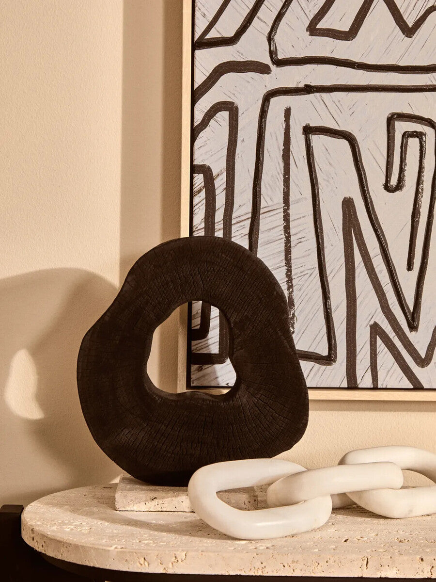 Image of Tibor Black Mango Wood Sculpture With Travertine Base