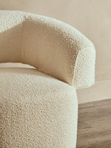 Image of Oliveto Ivory Boucle Curved Swivel Armchair
