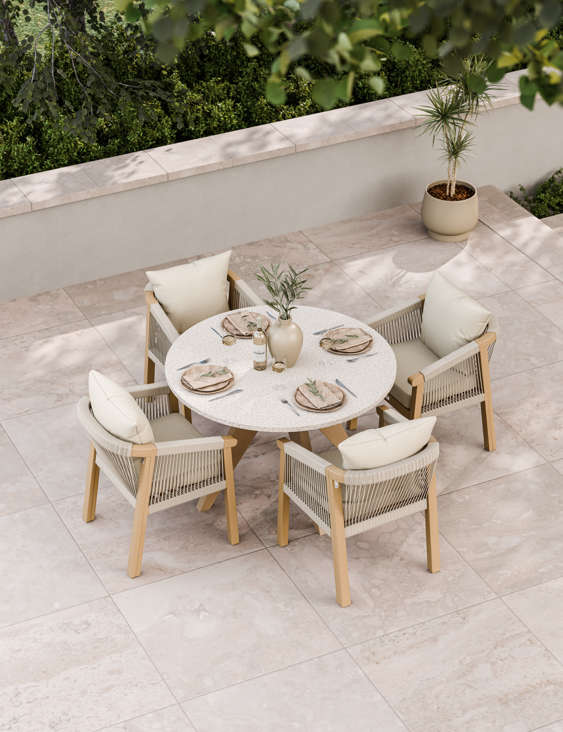 Round garden dining set with four woven chairs