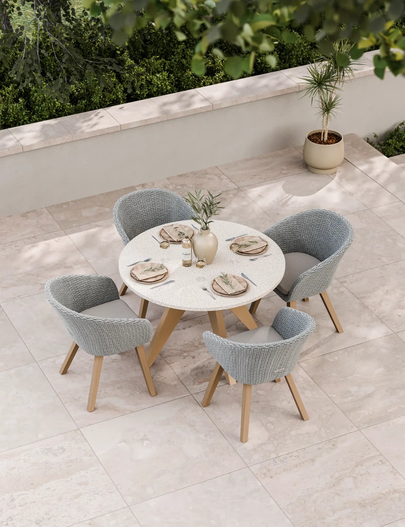 Image of Stylish four-seater round patio dining set in neutral tones