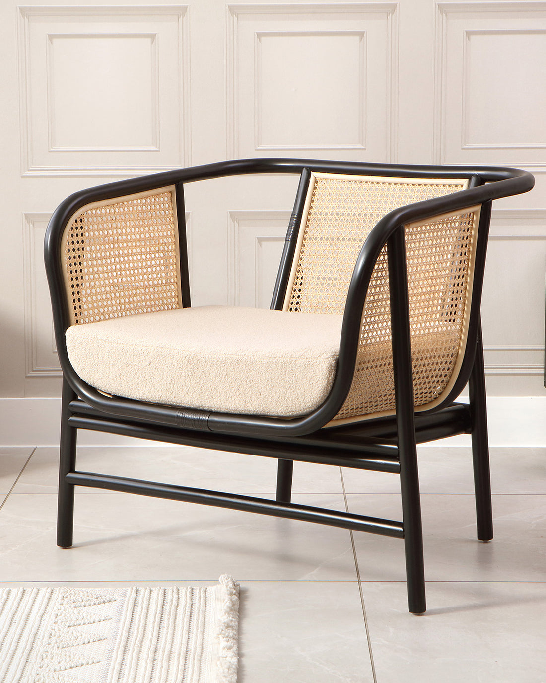 Antibes Black Rattan Boucle Lounge Chair