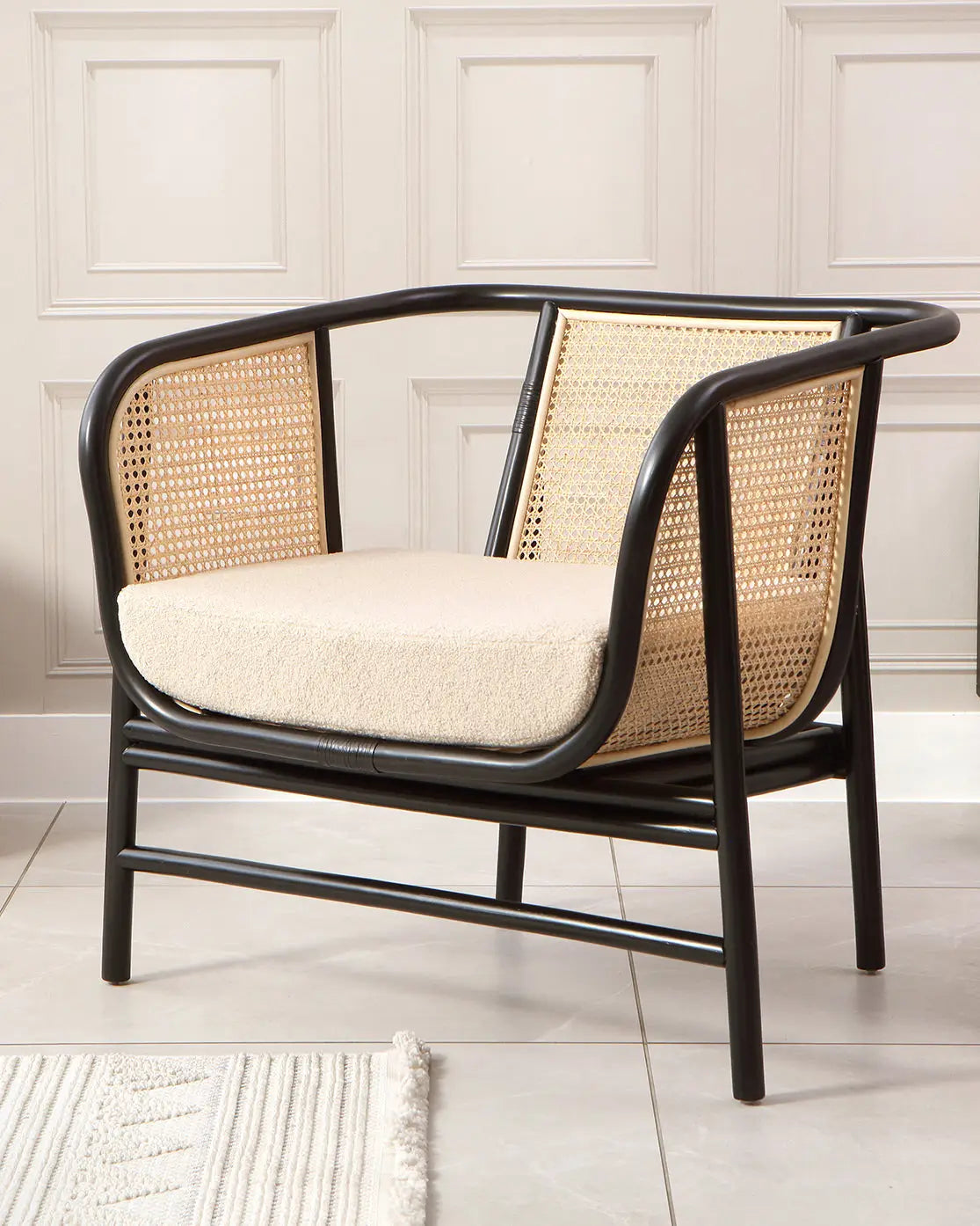Antibes Black Rattan Boucle Lounge Chair