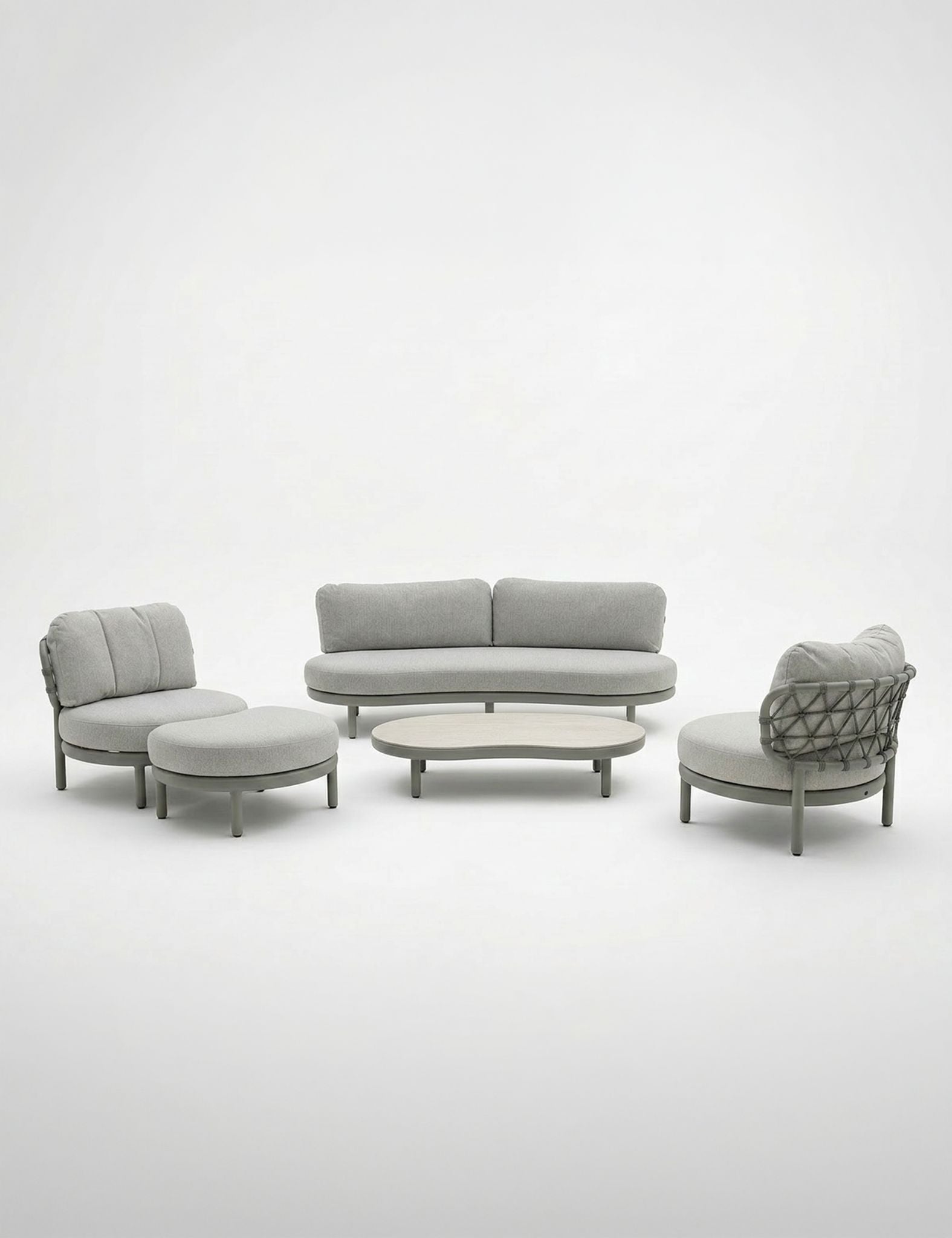 Image of Modern outdoor furniture set with a sofa, armchair, and table on a white background