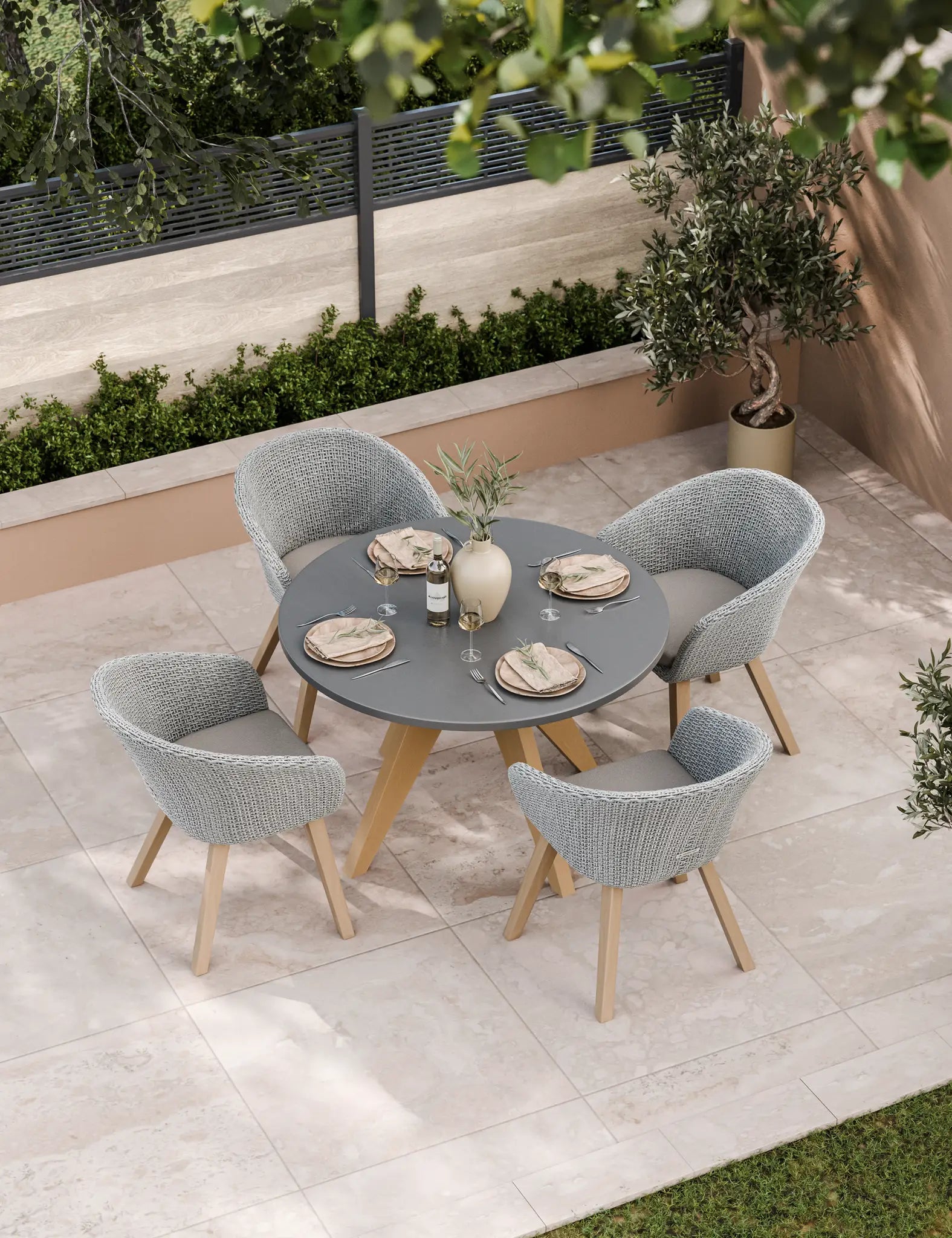 Image of Round garden dining set with four chairs