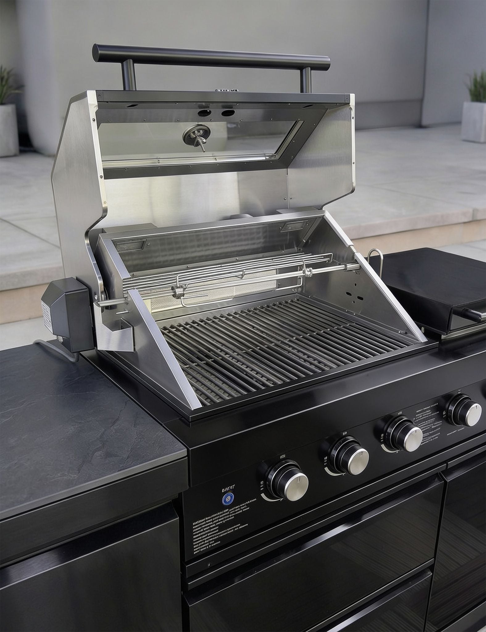 Image of Black and silver gas grill on a patio with a neutral background