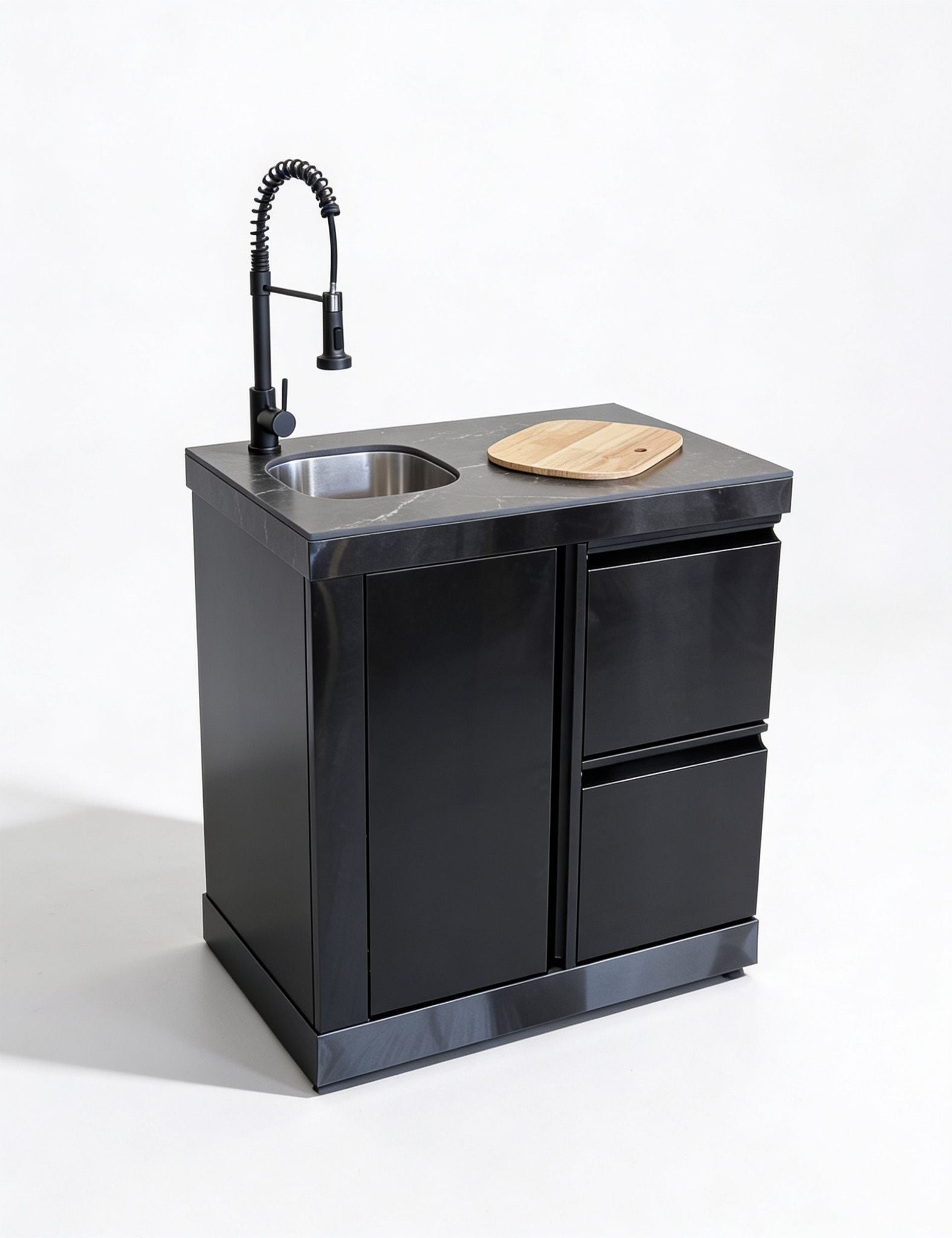 Image of Black kitchen sink unit with faucet and wooden cutting board on a white background