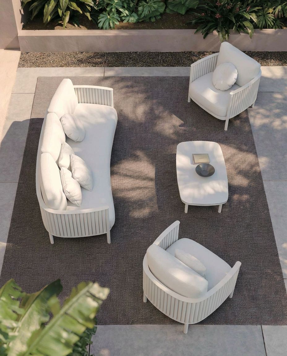 Image of Outdoor furniture set with a sofa, chairs, and coffee table on a patio.