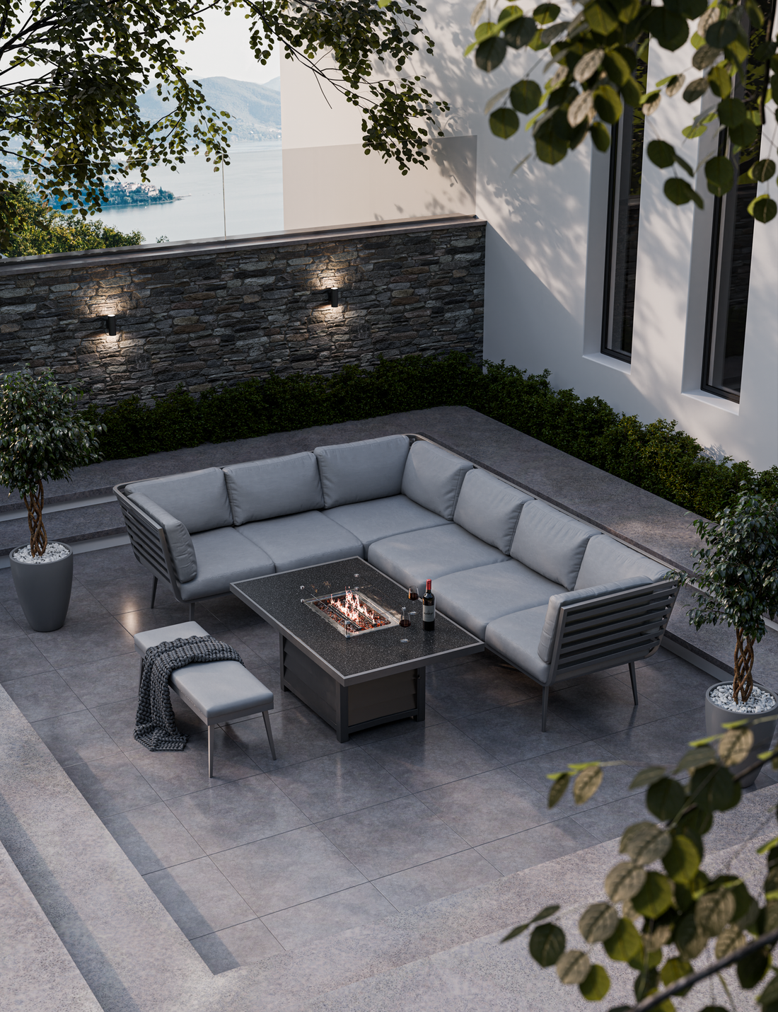 modern grey outdoor fire‚Äëpit lounge setup with sectional sofa and bench