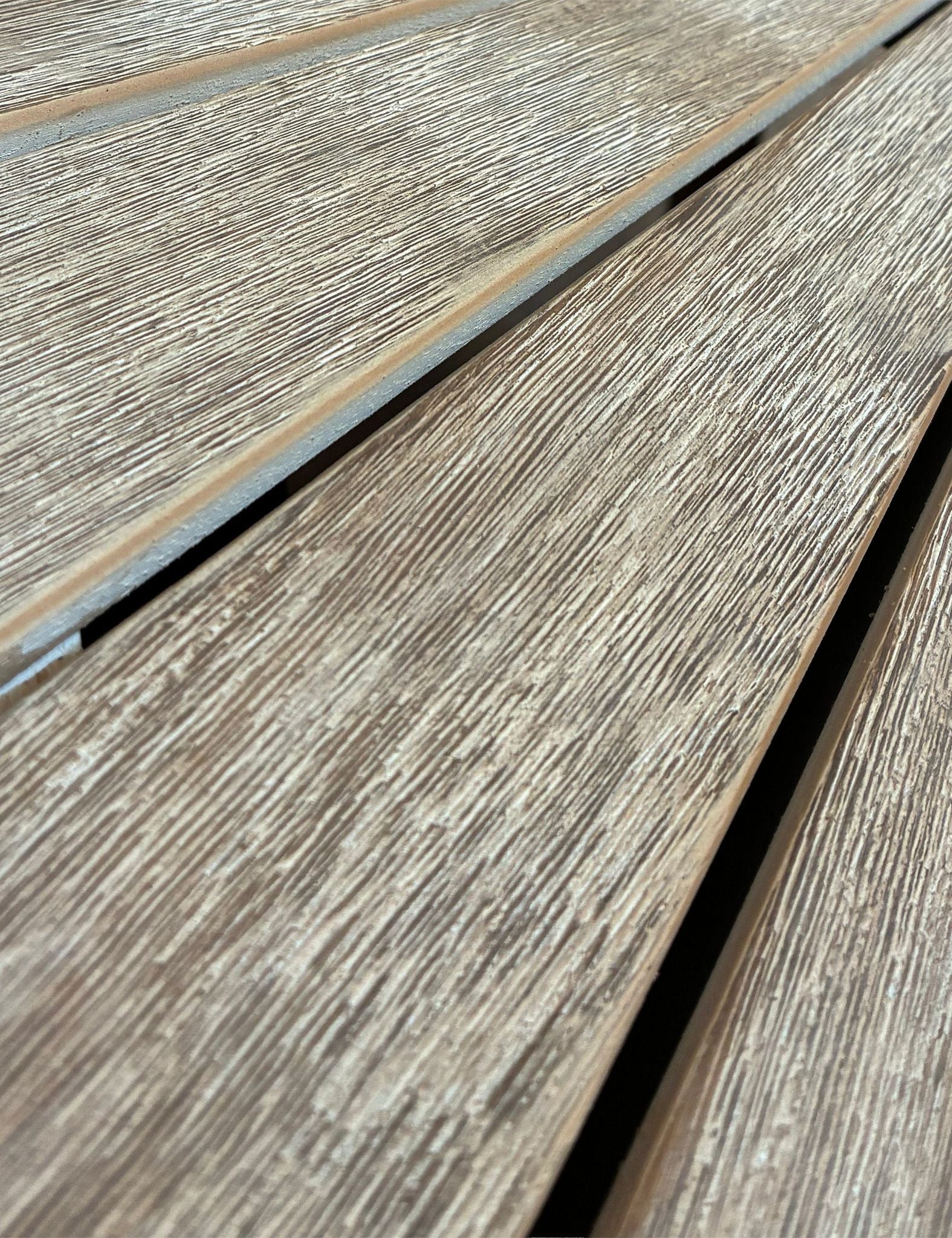 Image of Close-up of wooden deck planks with a visible grain pattern