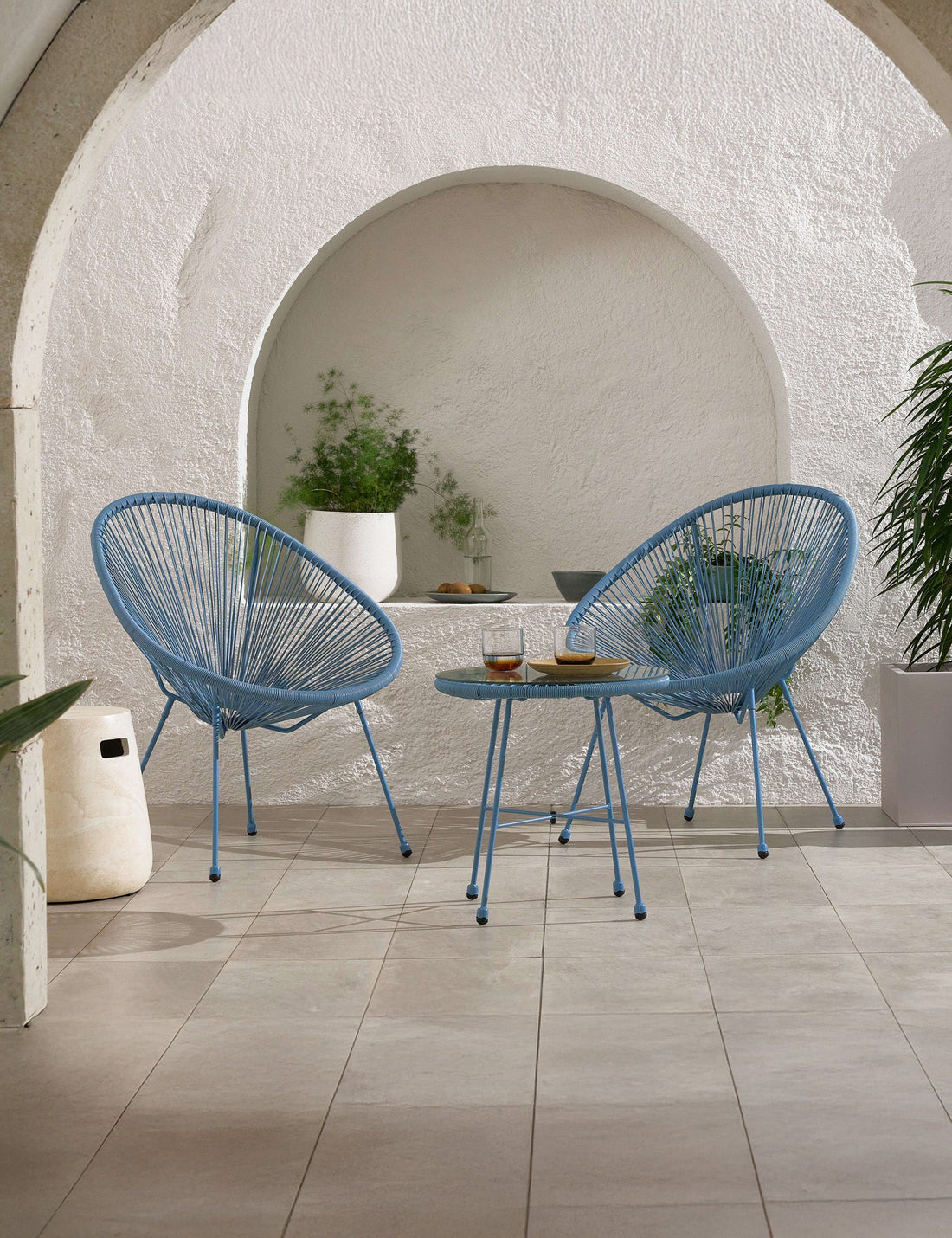 Modern blue outdoor bistro set with two chairs and round table
