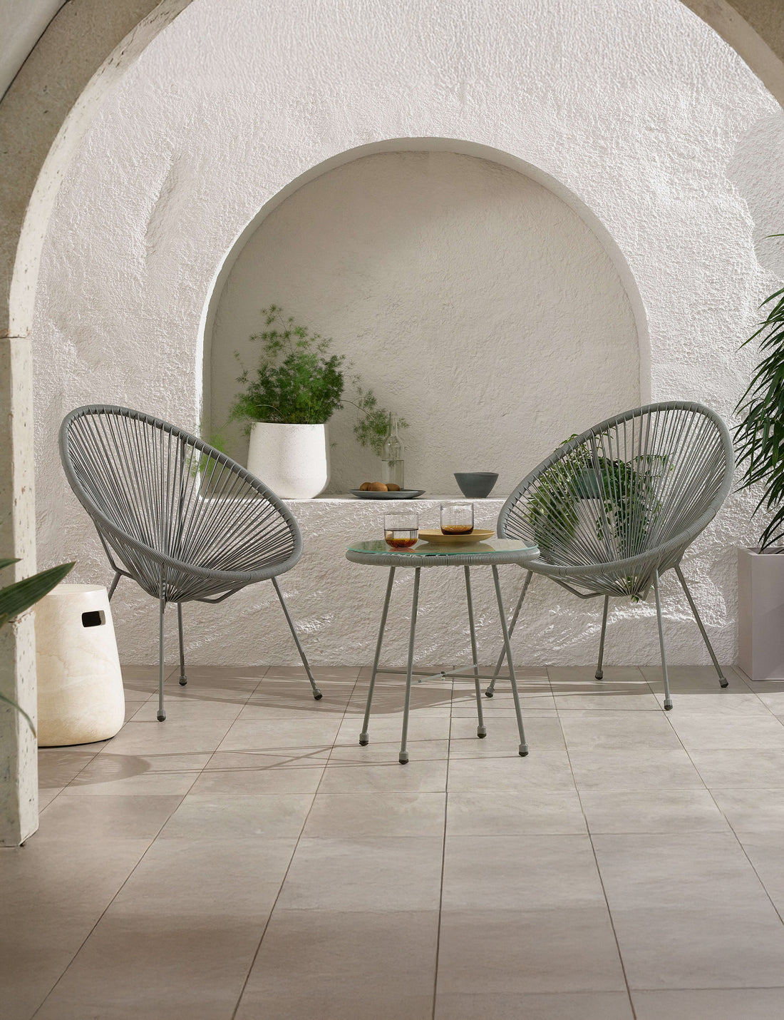 Modern grey outdoor bistro set with two chairs and round table