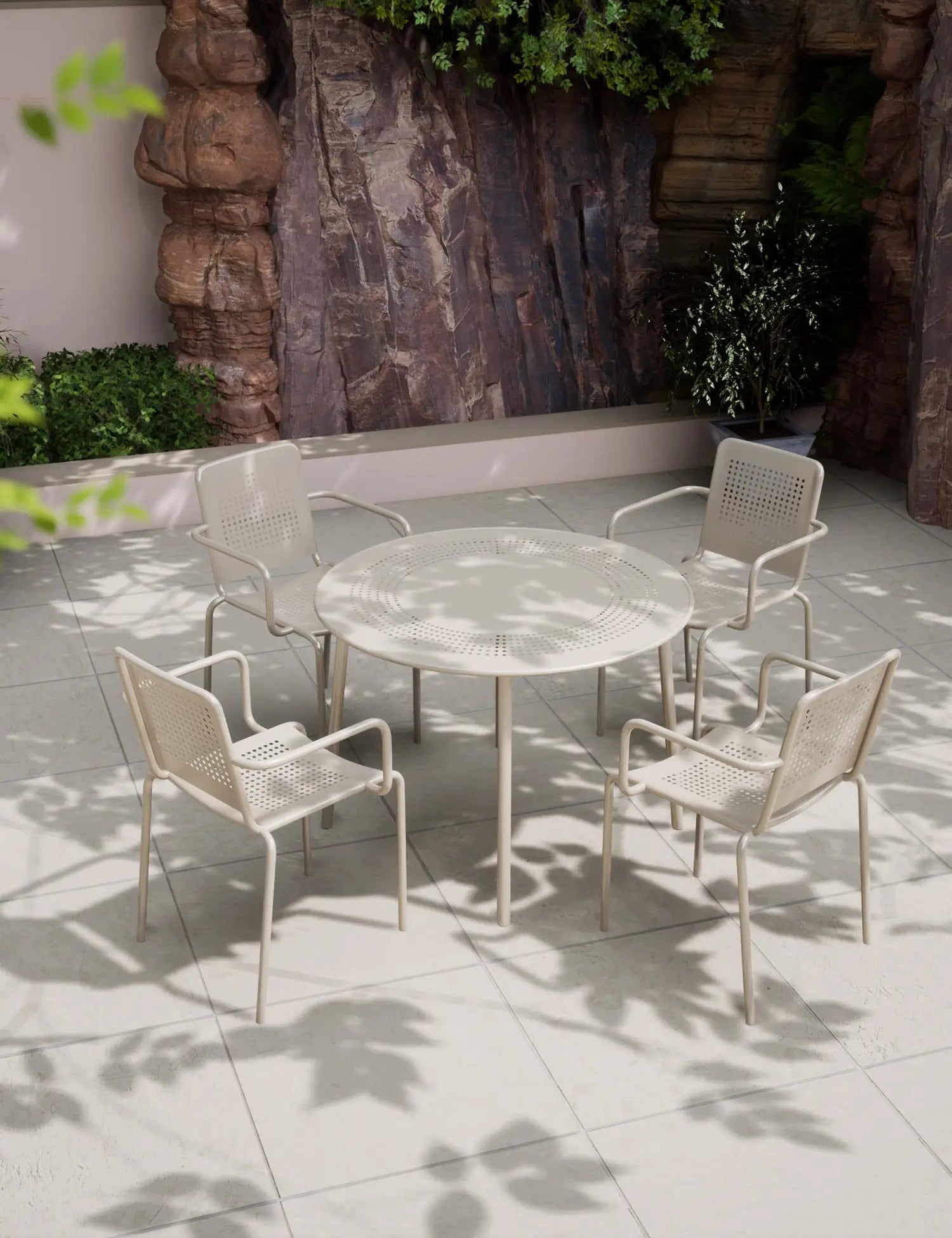 Image of Outdoor dining set with round table and four chairs