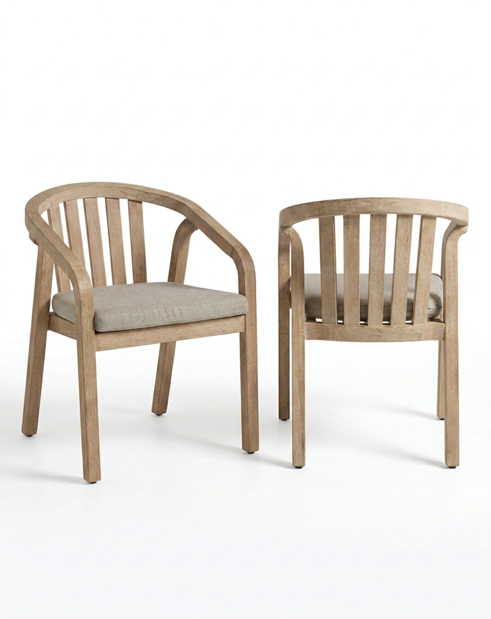 Two wooden chairs with gray cushions on a white background