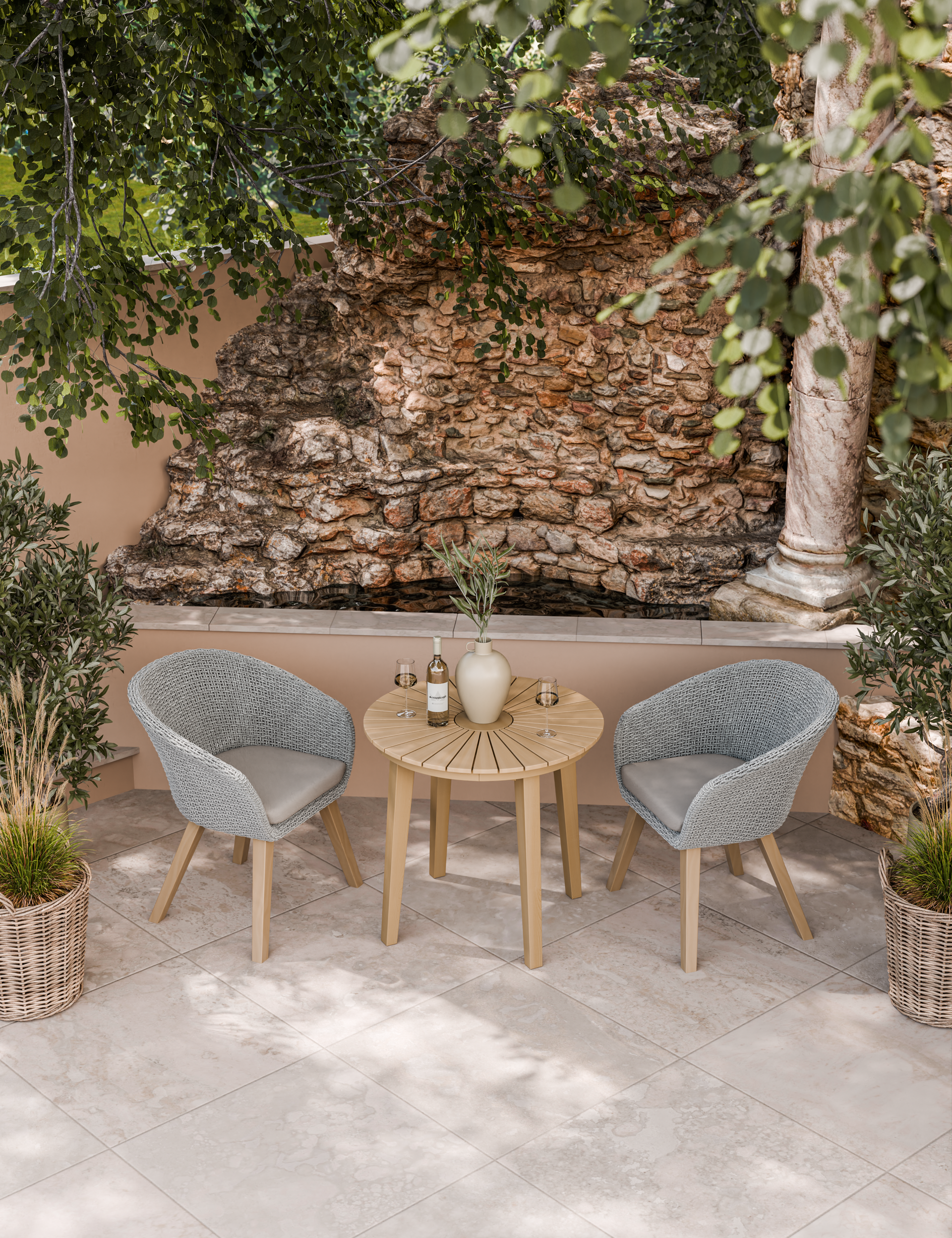 Grey bistro set with round table in garden patio