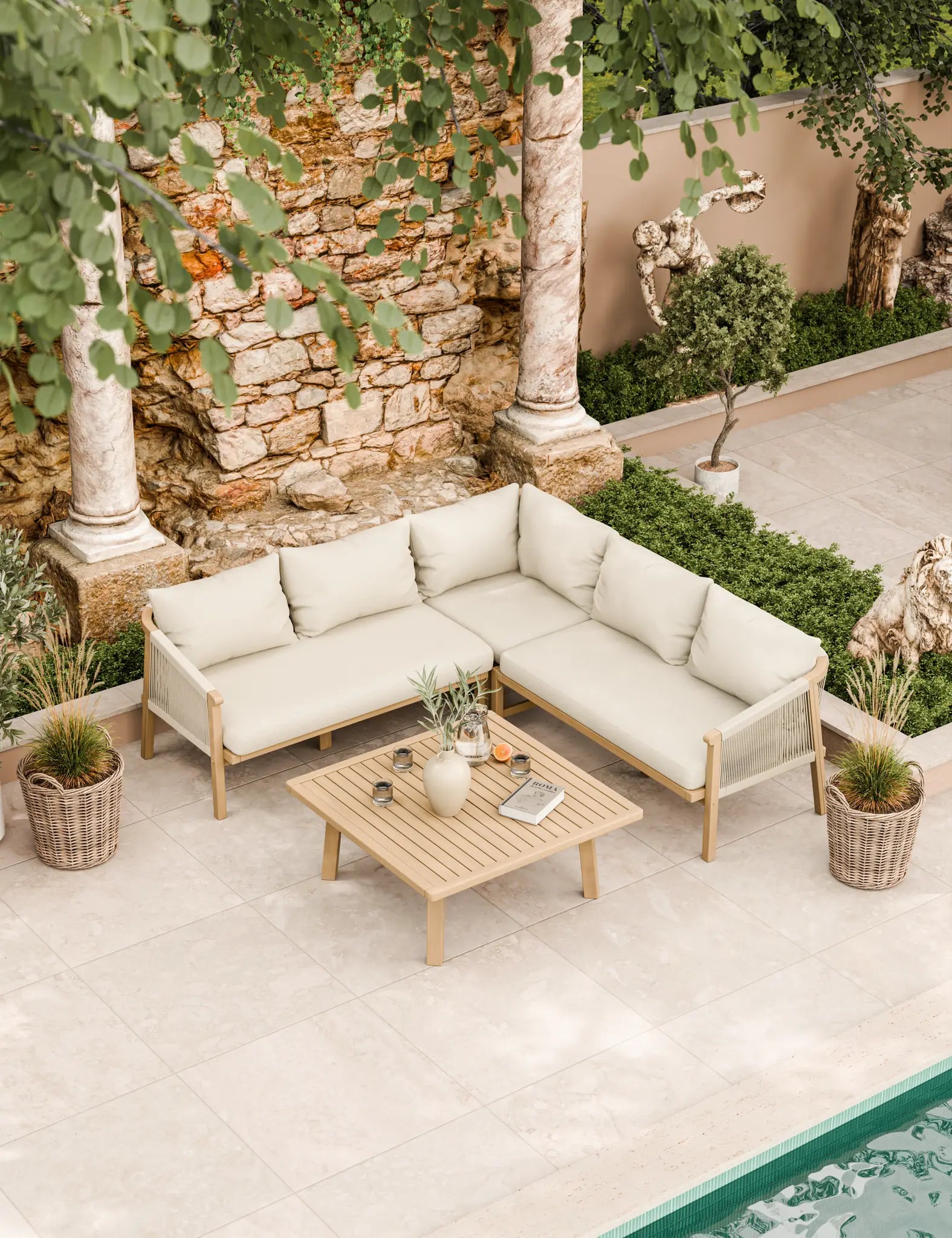 Cream corner sofa set with table by poolside patio