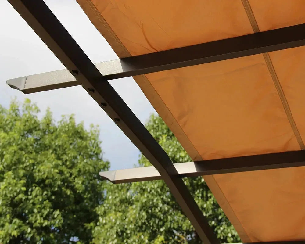 Image of Beige canopy with metal frame against a blurred green tree background