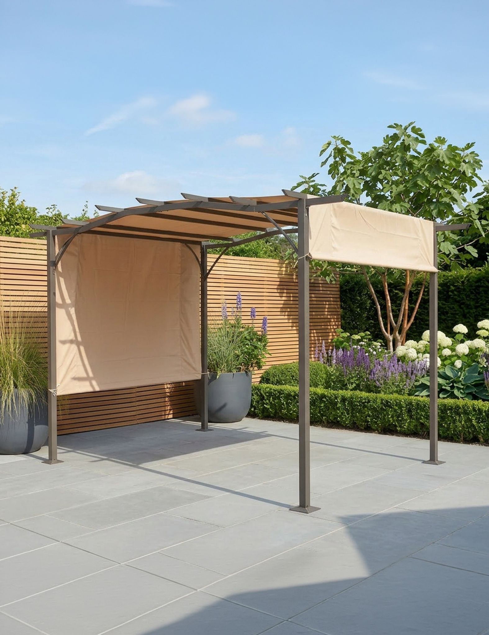 Image of Outdoor canopy with beige fabric cover in a garden setting