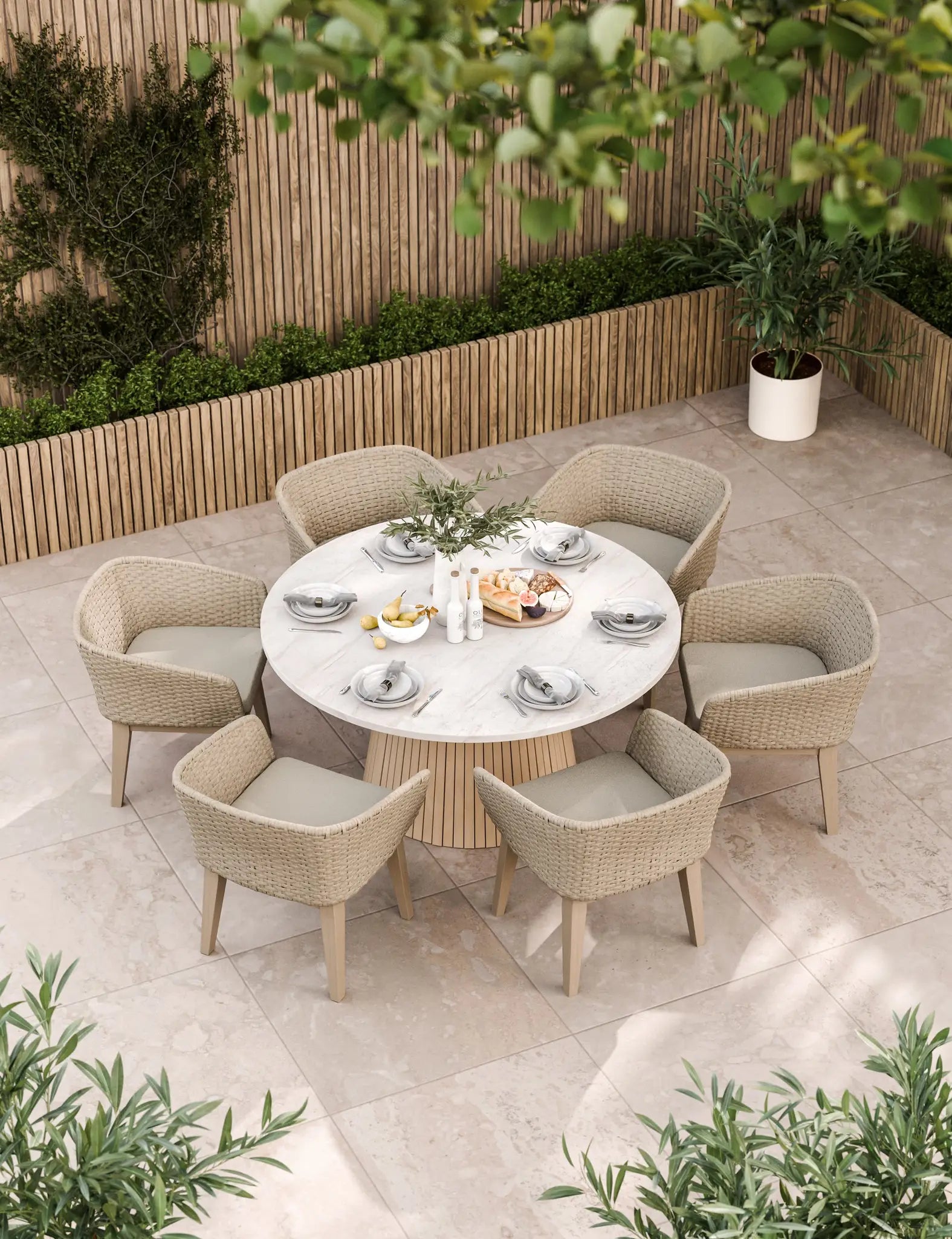 Image of Taupe outdoor dining set with round table and six chairs