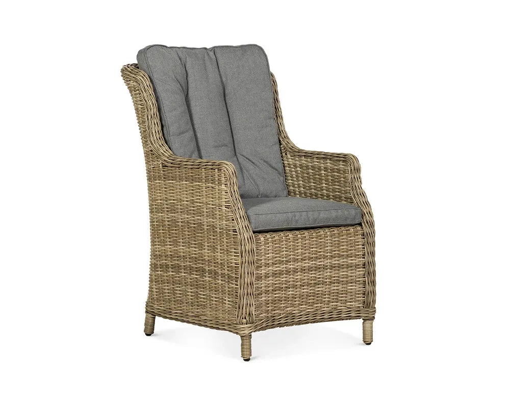 Image of Wicker armchair with gray cushions on a white background