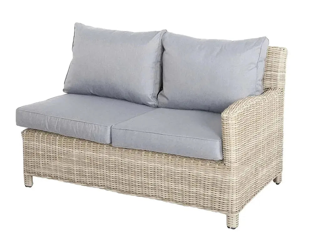 Image of Wicker outdoor loveseat with gray cushions on a white background
