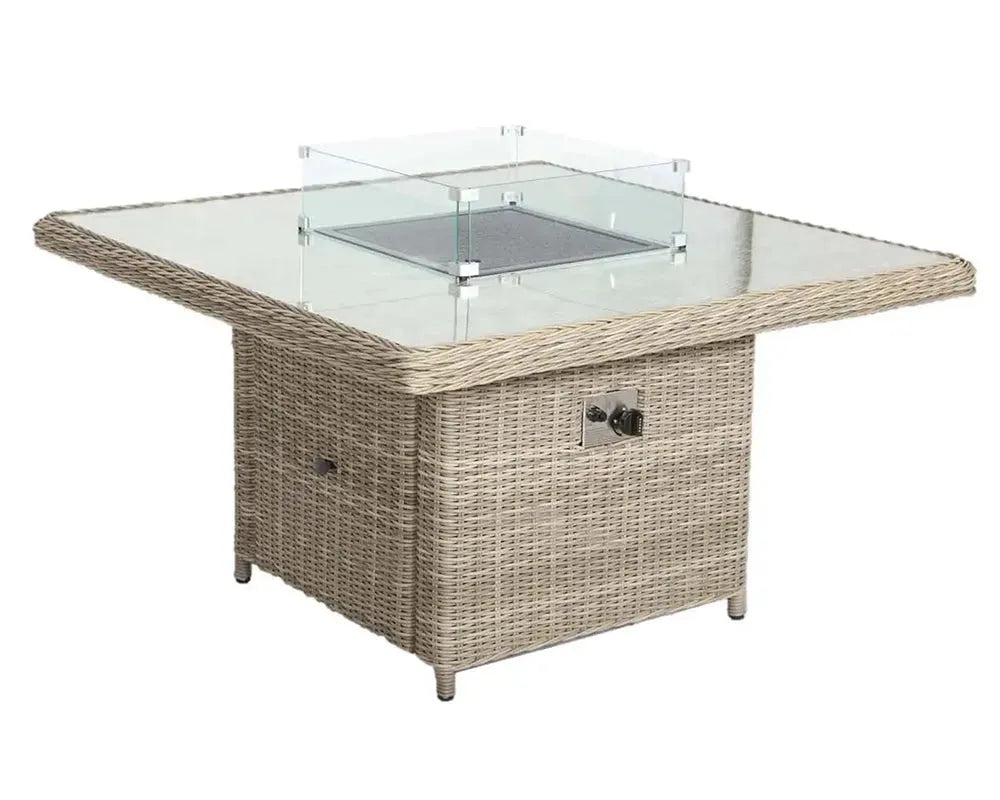 Image of Outdoor fire pit table with wicker design and glass top on a white background