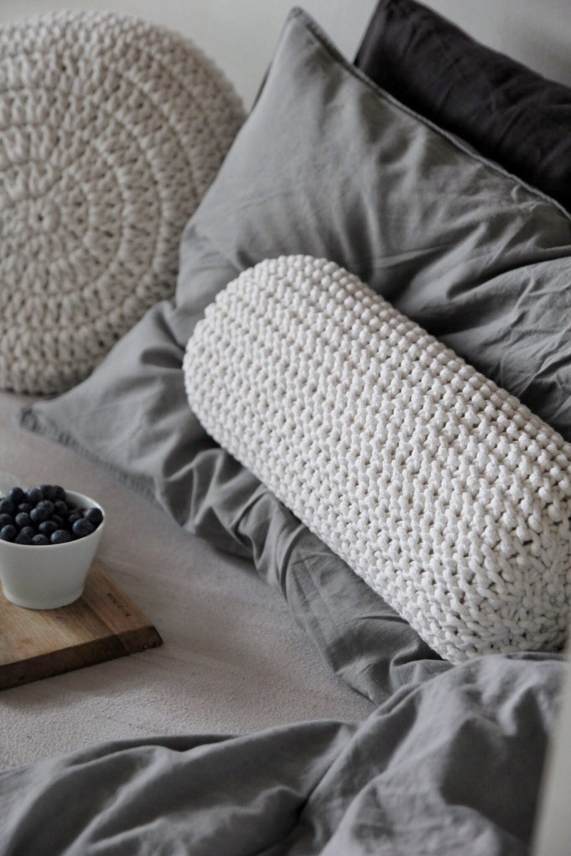 Image of Knitted bolster cushion | IVORY