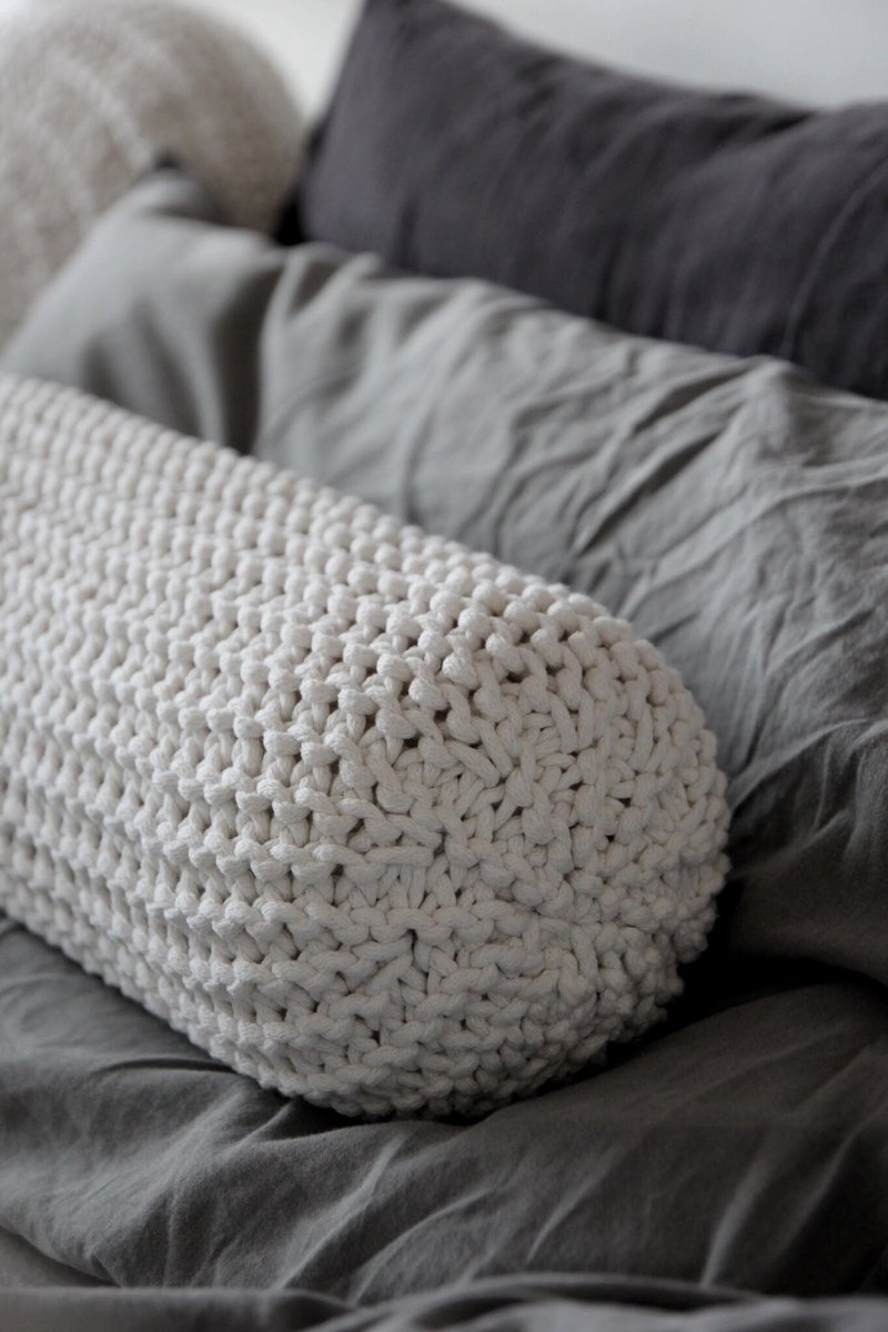 Image of Knitted bolster cushion | IVORY