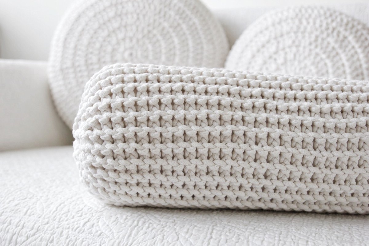 Image of Knitted bolster cushion | IVORY