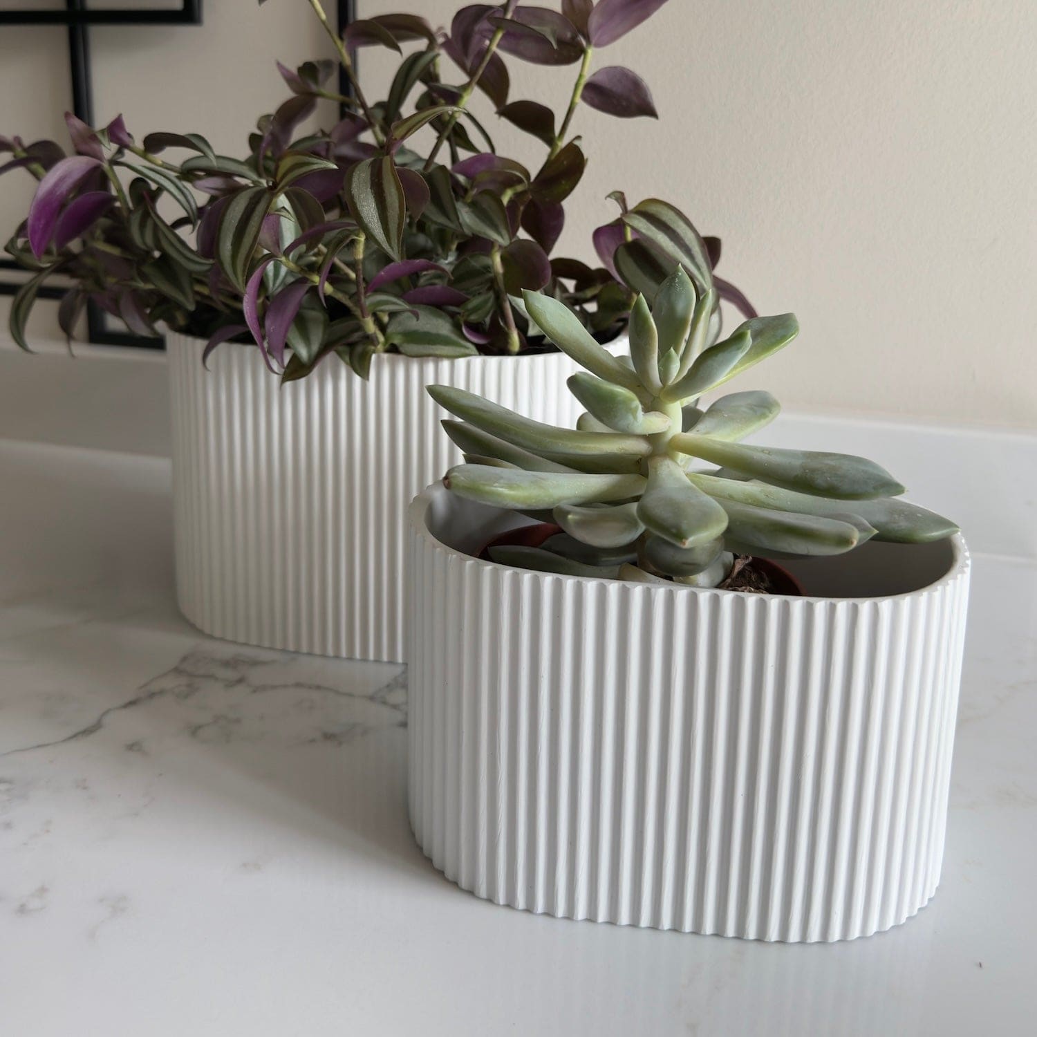 Image of Flutini | White Fluted Oval Stone Resin Indoor Plant Pots (2 Pot Set)