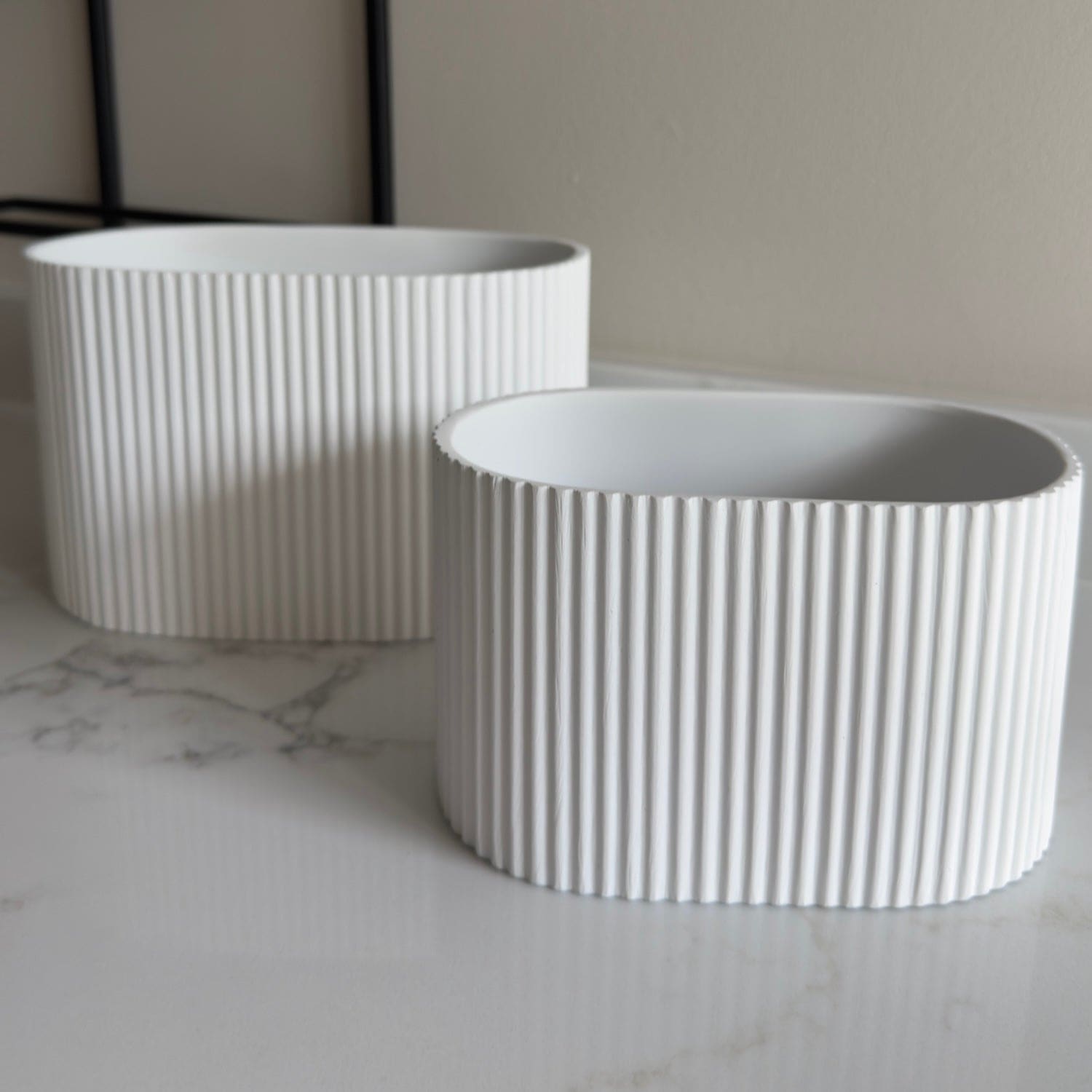 Image of Flutini | White Fluted Oval Stone Resin Indoor Plant Pots (2 Pot Set)